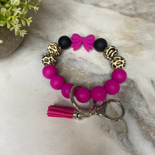 Load image into Gallery viewer, Silicone Bracelet Keychain - Magenta Bow

