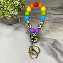 Load image into Gallery viewer, Silicone Bracelet Keychain - Rainbow Butterfly
