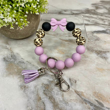 Load image into Gallery viewer, Silicone Bracelet Keychain - Purple Bow
