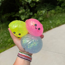 Load image into Gallery viewer, Squishy Toy - Viral Dumpling, Quick Squeeze Glitter - Yellow
