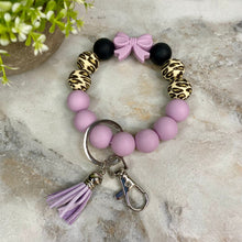 Load image into Gallery viewer, Silicone Bracelet Keychain - Purple Bow
