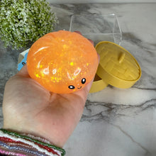 Load image into Gallery viewer, Squishy Toy - Viral Dumpling, Quick Squeeze Glitter - Orange
