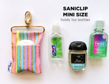 Load image into Gallery viewer, Aqua with Coral Floral SaniClip Hand Sanitizer Holder
